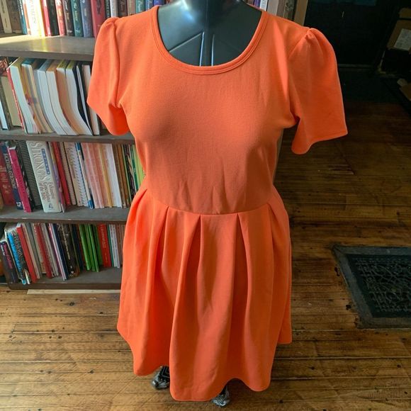LuLaRoe Dresses & Skirts - Lularoe orange Amelia fit and flare XL knit dress with pockets